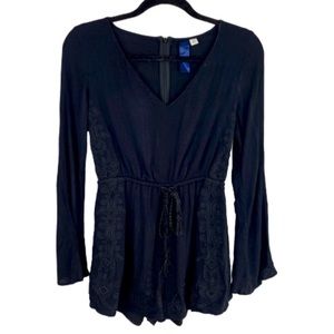 Francesca’s long sleeved knit/lace black romper